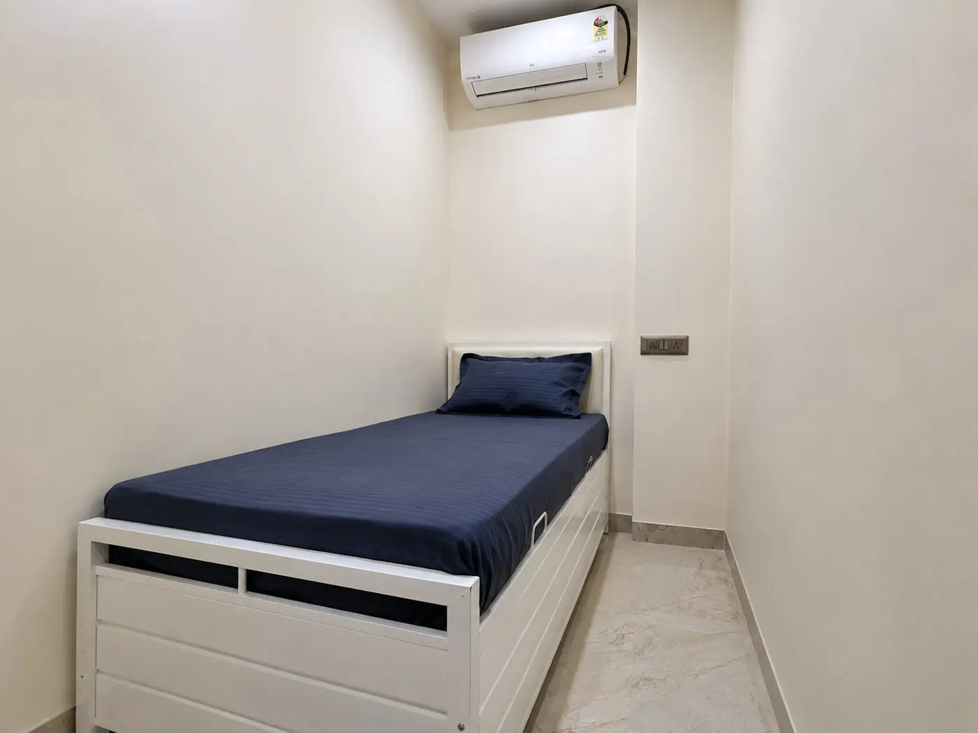 Zest Stays Goregaon West — private AC room in a PG on New Link Road near Oshiwara Depot