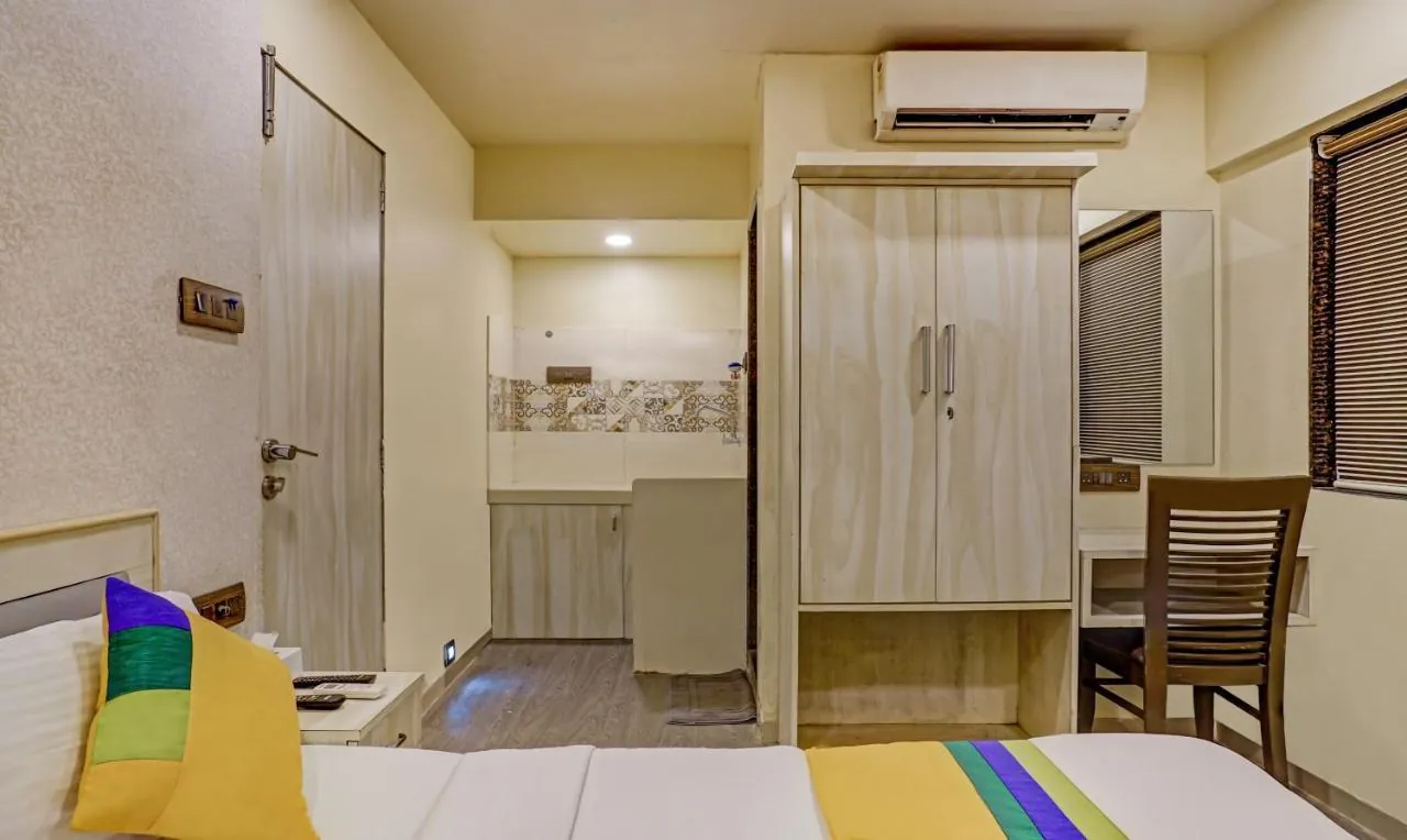 Premium bedroom setup with dedicated study table and large wardrobes in Vakola